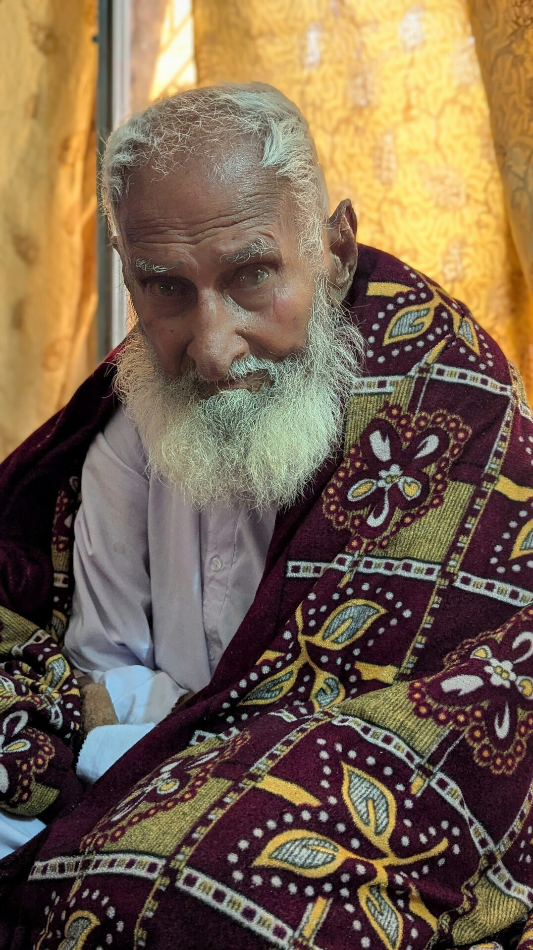 Portrait of a man with a light beard looking at the camera