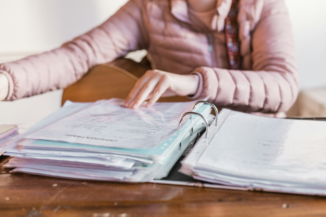 person reviewing insurance documents