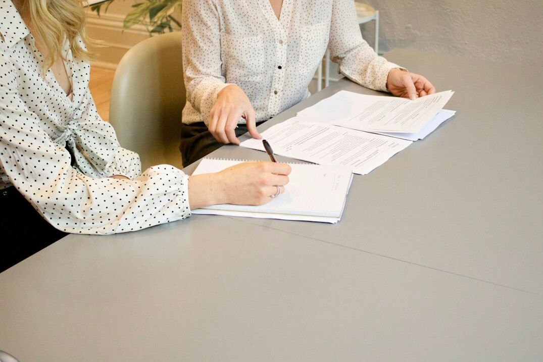 insurance agent discussing policy with client